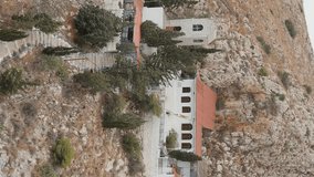 Vertical video. Athens, Greece. St Marina of Neon Ikonion. Greek Orthodox Church. Perama, Aerial View, Point of interest