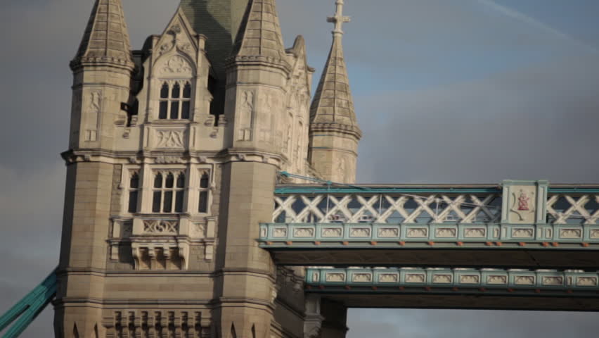 Panning view of the top left tower on Tower Bridge, pans to the right, located