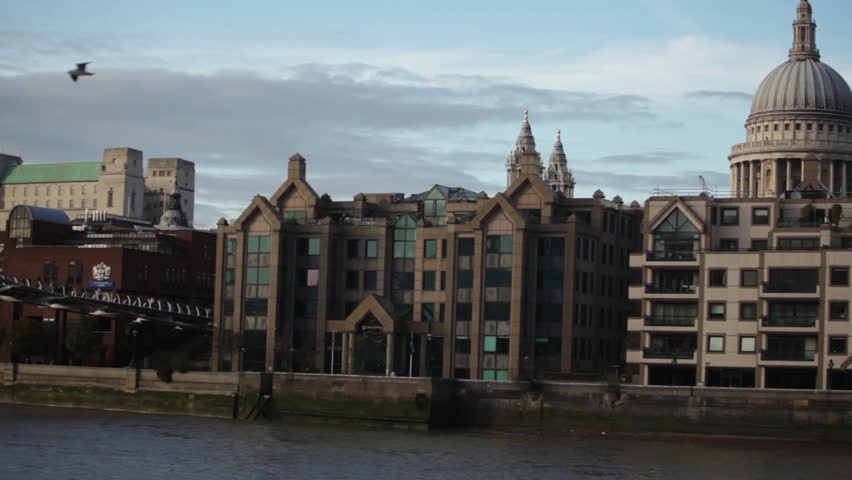 Distant view of Saint Paul's Cathedral with other buildings in foreground in