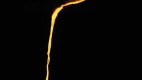 Yellow Molten Liquid Metal Pouring Out of Furnace. Metallurgy, Steel Casting. Foundry. Thin Beautiful Stream in the Dark, Perfect Factory Scene. Non ferrous Manufacture. Close up. Slow Motion - Powered by Shutterstock - Get 15% off with code: PIKWIZARD15