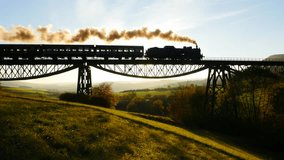 Locomotive Crossing a Rural Bridge during Midday - Powered by Shutterstock - Get 15% off with code: PIKWIZARD15