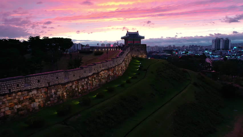 Drone view, Hwaseong Fortress during dusk and sunset sky, South Korea