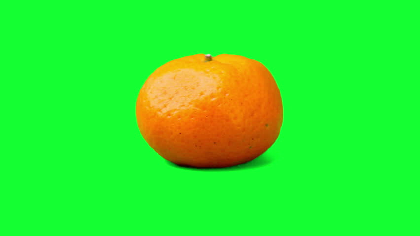 Fresh mandarin oranges fruit or tangerine on green Royalty-Free Stock Footage #3438745031