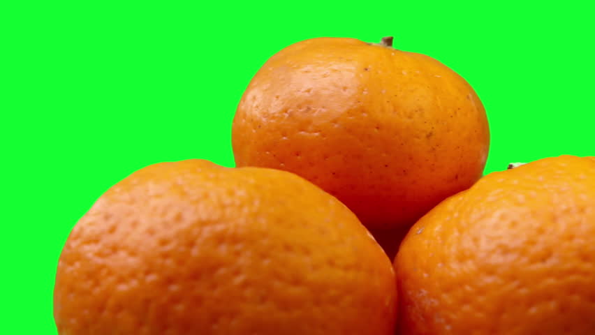 Fresh mandarin oranges fruit or tangerine on green Royalty-Free Stock Footage #3438745405