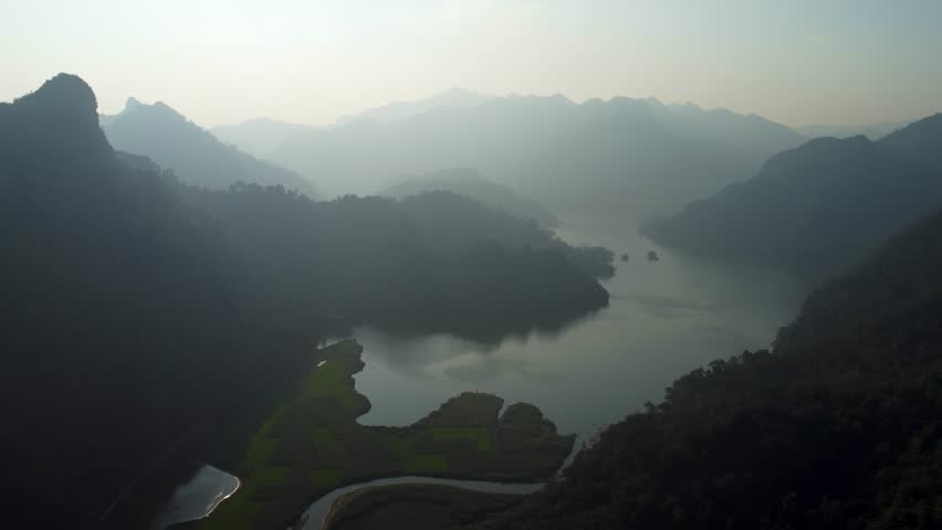 Amidst the mist of Ba Be, the sounds of nature take on surreal quality