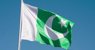 Experience the majestic fluttering of the Pakistan state flag in this captivating Shutter Stock video. Immerse yourself in the vibrant colors and rich symbolism of the Pakistani flag.