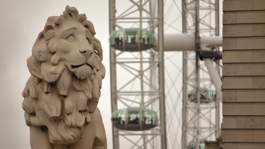 South Bank Lion on Westminster Bridge with London Eye in Background, located in