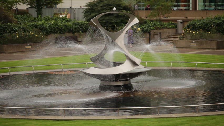 Close up view of Revolving Torsion Fountain Sculpture in London, England.