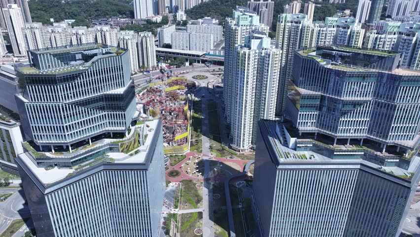 Hong Kong Kai Tak Subway Station roof land development is developed into a multi-functional CBD urban area including commercial residences, retail offices and parks and leisure facilities