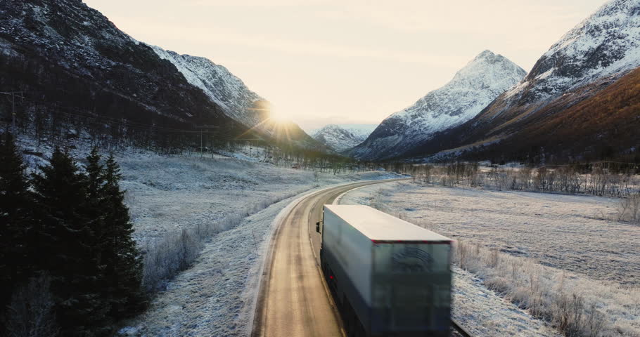 Vital Arctic Logistics: The Essential Role of Lorry Transportation on Norway's Snow-Covered Mountain Roads in Winter