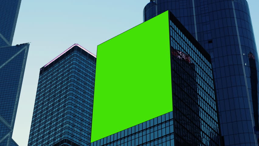 Large billboard with a green screen for advertising on the building wall. Royalty-Free Stock Footage #3439395373