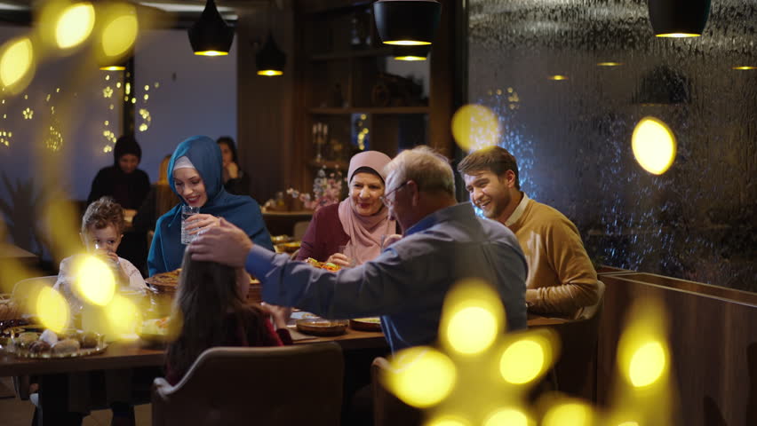Muslim Family Drinking Water at the Restaurant on Eid or in Ramadan Royalty-Free Stock Footage #3439433969