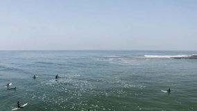 Aerial view of longboard surfers waiting at line up to surf at Atlantic Ocean, Imsouane, Morocco. - Powered by Shutterstock - Get 15% off with code: PIKWIZARD15