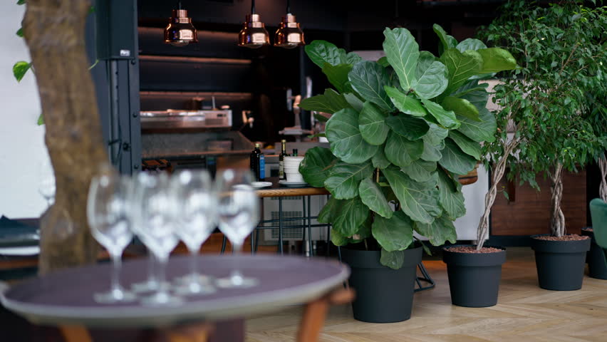 luxury restaurant interior with glass glasses tables hospitality and service concept