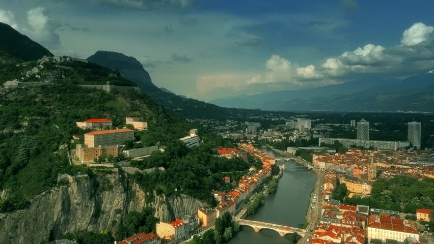 Aerial iconic shot of historic part of Grenoble involving famous Telepherique, a ropeway to Bastille Fort, France