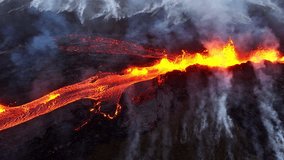 Dramatic volcanic eruption of the Litli Hrutur volcano in Reykjanes peninsula, Birth of a new volcano, First day of eruption, incredible aerial view in Iceland, Flowing lava from the crater - Powered by Shutterstock - Get 15% off with code: PIKWIZARD15
