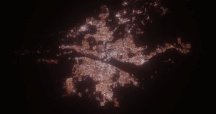 Khartoum and Omdurman (Sudan) top view at night. View on modern city from satellite. Camera is zooming in, rotating counterclockwise. Vertical video. The north is on the left side
