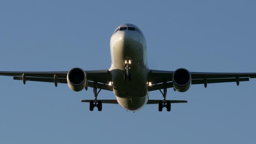 Modern Commercial Airplane Taking Off on a Sunny Day