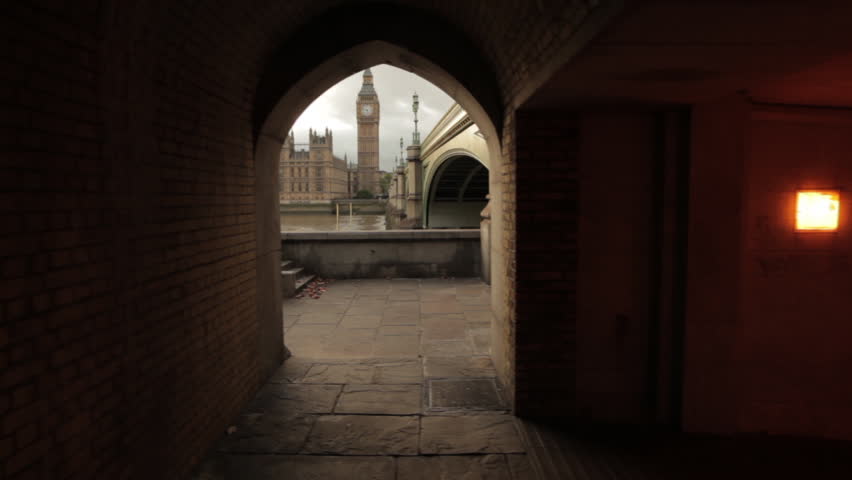 A tunnel archway viewing Big Ben in London