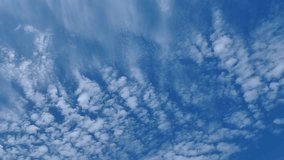 Video of blue sky with white clouds. Stock clip with a beautiful view of the sky in full HD.