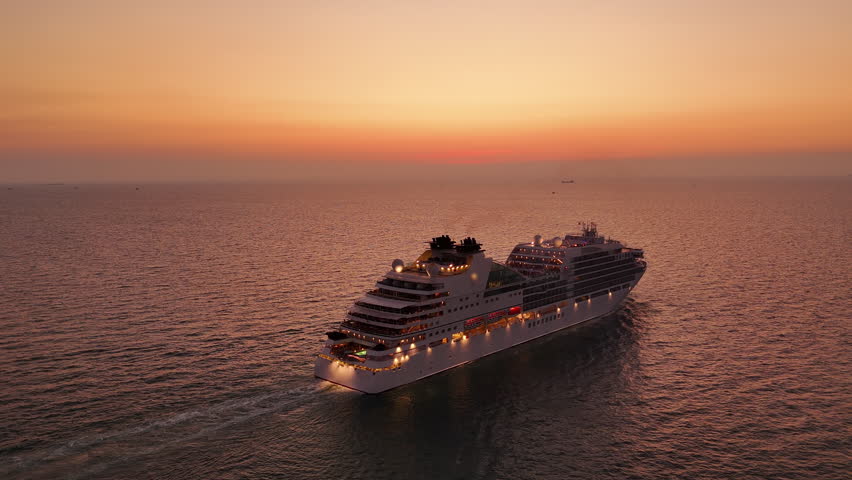 Cruise Ship after sunset, Cruise Liners beautiful white cruise ship above luxury cruise in the ocean concept exclusive tourism travel on holiday take a vacation time on summer.