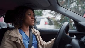 Female nurse going home from work. Female doctor driving car to work, on-call duty. Work-life balance of healthcare worker as parent and partner. - Powered by Shutterstock - Get 15% off with code: PIKWIZARD15