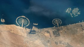 Artificial Islands of the Coast of Dubai, World Islands, Palm Jumeirah and Palm Jebel Ali, in  United Arab Emirates, Seen from Space. Elements of this Video furnished by NASA. 