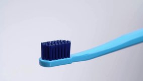 woman brushing teeth at bathroom sink Morning Teeth Brushing. smiling, oral hygiene. Beautiful slider shot of toothpaste. prevent tooth decay