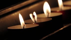 votive candles flames slow motion - Powered by Shutterstock - Get 15% off with code: PIKWIZARD15