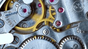 macro clockwork mechanism of an old Watch disassembled with cogwheels running slowly on silver steel hands gear movement working close up detail antique Pocket watch, Clock, Analog, Vintage,Mechanical - Powered by Shutterstock - Get 15% off with code: PIKWIZARD15