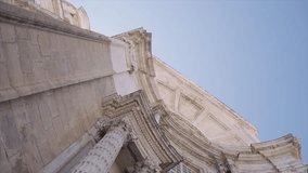 Directly below footage of Cadiz Cathedral against clear blue sky at Andalusia, Spain