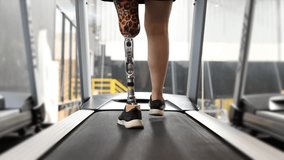 Wonder disabled woman walks exercise on a treadmill, strong woman healthy and powerful - Powered by Shutterstock - Get 15% off with code: PIKWIZARD15