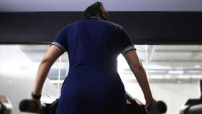 Wonder disabled woman walks exercise on a treadmill, strong woman healthy and powerful - Powered by Shutterstock - Get 15% off with code: PIKWIZARD15