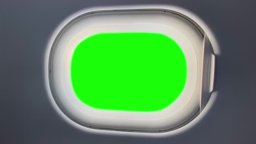 Zooming into the Airplane Window with Green Screen 4K Footage for overlay. Airplane window zoom concept background