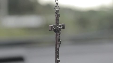 Cocle, Panama - December 04, 2017: Close up view, silver crucifix hanging
