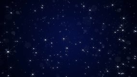Bright shiny twinkling stars in the night sky moving towards the camera. This glittering starry night motion background is full HD and a seamless loop. - Powered by Shutterstock - Get 15% off with code: PIKWIZARD15