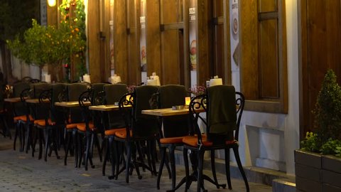 Tables in cafe on the street. Street Cafe. Restaurants in Paris Adlı Stok Video