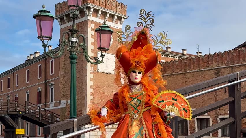 Venice Carnival. People in Venetian carnival masks and costumes on streets of Venice, Italy, Europe February 10, 2024. High quality 4k footage