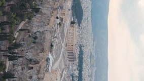 Vertical video. Athens, Greece. Acropolis of Athens in the early morning. Cloudy weather. Summer, Aerial View, Point of interest