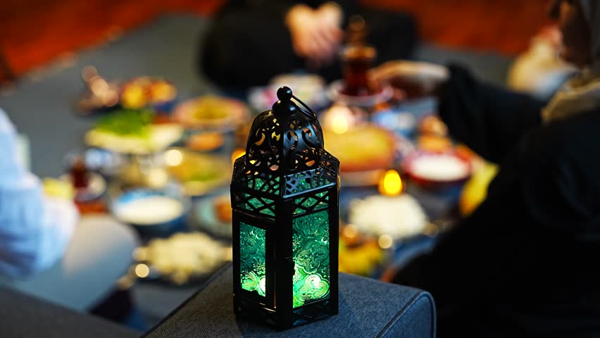 Ramadan Iftar Table.Muslim Family Having Dinner At Home.Iftar Table Turkish Traditional Food.Fasting ends with Dates.Ramadan Feast Celebrations, Eid Mubarak Concept Video, Uskudar Istanbul, Turkiye  Royalty-Free Stock Footage #3441675993