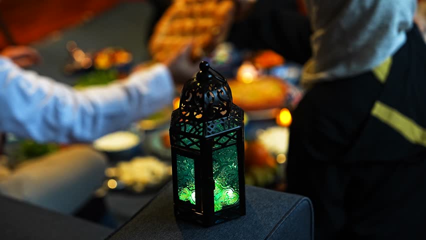 Ramadan Iftar Table.Muslim Family Having Dinner At Home.Iftar Table Turkish Traditional Food.Fasting ends with Dates.Ramadan Feast Celebrations, Eid Mubarak Concept Video, Uskudar Istanbul, Turkiye  Royalty-Free Stock Footage #3441676935
