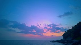 Time lapse day to night dramatic sky with colorful cloudscape.
amazing sunset at Karon beach. 
Gradient color colorful sky in bright sunset background.
Sunset with colorful light rays Gradient color