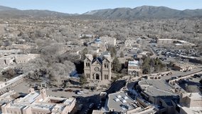 Downtown Santa Fe, New Mexico with drone video wide shot moving in a circle.
