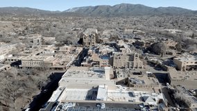 Downtown Santa Fe, New Mexico with drone video wide shot moving in.