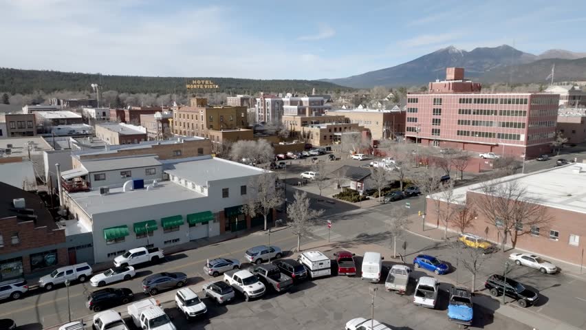 Flagstaff, Arizona downtown with drone video moving in a circle.