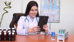 Online video call on digital tablet smiling female doctor nurse talking patient 