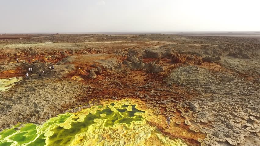 Volcanic crater lake. Dallol Geothermal area. Crystalline sulfides in an acid pool. Geothermal field of Danakil Depression. Hot springs and acid mineral in surreal landscape in Ethiopia, Africa