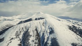 aerial video shot of the mountains in winter 