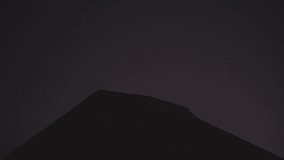 Dramatic close-up of Fuego Volcano's erupting crater at night, spewing large amounts of molten lava into sky - Powered by Shutterstock - Get 15% off with code: PIKWIZARD15