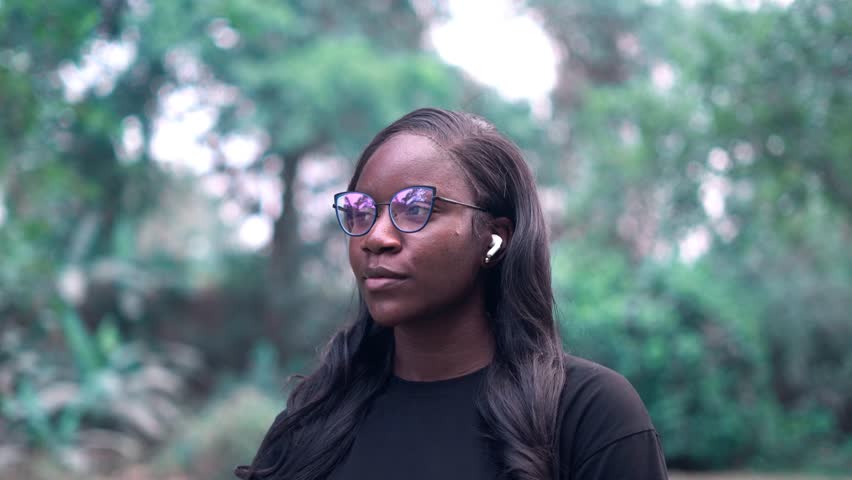 Smiling Black girl with glases